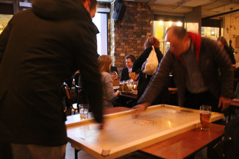 Ukens spill: Shuffle Puck (analog airhockey)